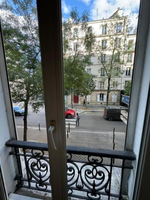Charmant Appartement Alesia Parijs Buitenkant foto