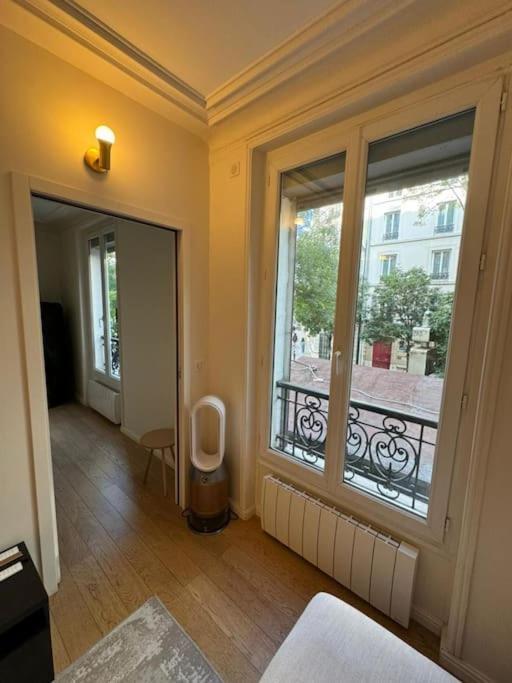 Charmant Appartement Alesia Parijs Buitenkant foto